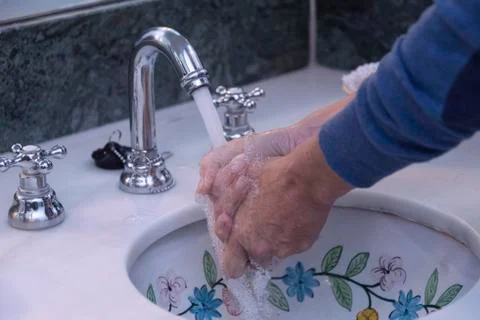 Hands washing Stock Photos