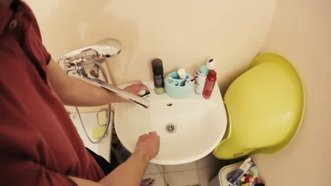 Hands washing in the sink Stock Footage 103329500