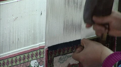 Hands weaving carpet, close-up, China Stock Footage 56606520