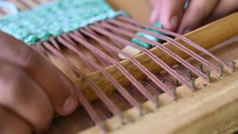 Hands Weaving Colorful Threads with Bamboo Shuttle Atayal Traditional Texti.. Stock Footage 340414335