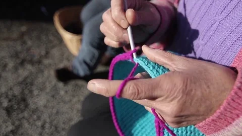 Hands weaving by sea Stock Footage 77046747