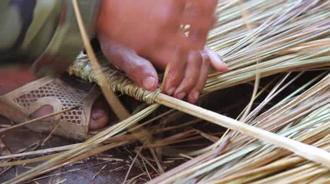 Hands Weaving Thatch Construction Material Stock Footage 26086543
