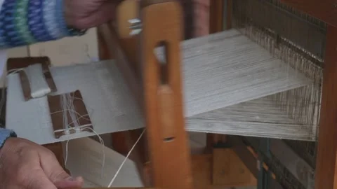 Hands Weaving on Traditional Loom Side View Stock Footage 316487077