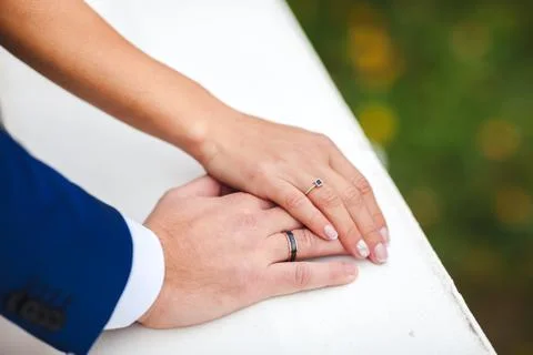 Hands with wedding rings Stock Photos