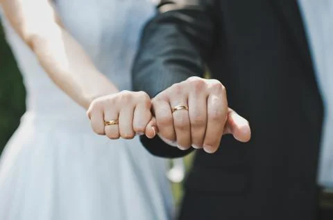 Hands with wedding rings  Stock Photos