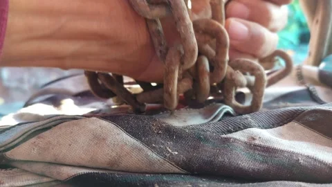 Hands were wrapped in chains and smashed Stock Footage 261973050