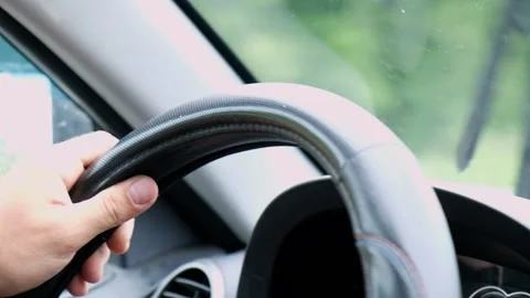 Hands on wheel. Driving Car. Unrecognizable Driver Holding Steering Wheel Stock Footage 202264847