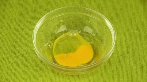 Hands whipping eggs Stock Footage 52942760