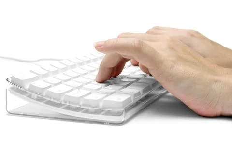 Hands on a White Computer Keyboard 스톡 사진
