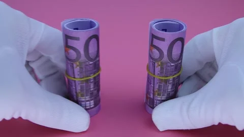 Hands in white gloves move 2 rolled 500 euro banknotes, close-up 스톡 동영상 141926866