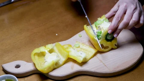 Hands of woman using kitchen knife slice Stock Footage 128316268