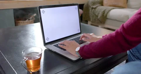 Hands of woman using laptop with copy space on screen at home, slow motion Stock Footage 341240039