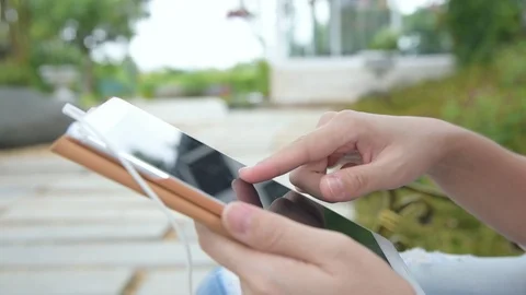 Hands of a woman using tablet computer Stock Footage 95505482