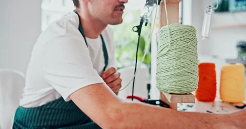 Hands, wool and creative person at workshop for sewing, tufting or knitting for Stock Footage 306436201