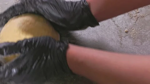 Hands work with dough to make bread. Stock Footage 155522725