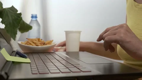 Hands work on the laptop keyboard. Stock Footage 158319180