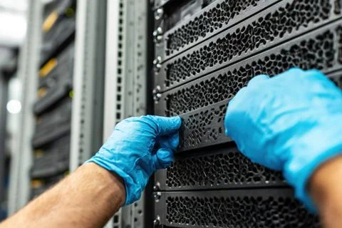 Hands work on server rack 스톡 사진