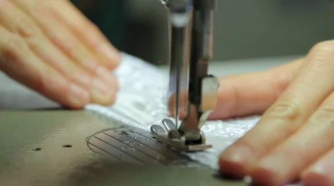 Hands work a sewing machine Stock Footage 22037882