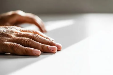 Hands at work in soft light 스톡 사진