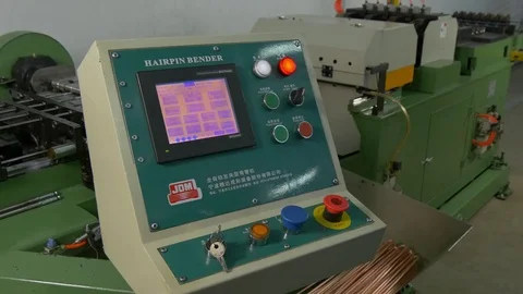 Hands of worker check contacts voltage indicator in electronics in factory. Stock Footage 82681533