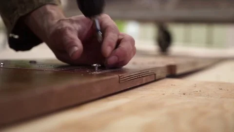 Hands of the Worker Draw The Size On a Board Stock Footage 73016550