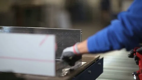 Hands of worker in the factory rivet Stock Footage 77249761