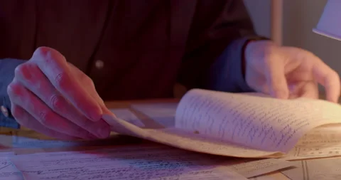 The hands worker find the necessary information in paper documents. Video stock 194111734