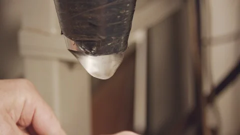 Hands of worker packing roasted coffee beans into bags Video stock 107774473