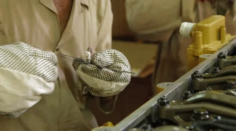 Hands Of A Worker Repairing Car Engine Stock Footage 62083019