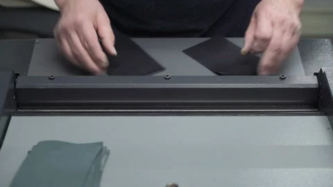 Hands of worker undercutting leather details. Production of leather goods Video stock 247503201