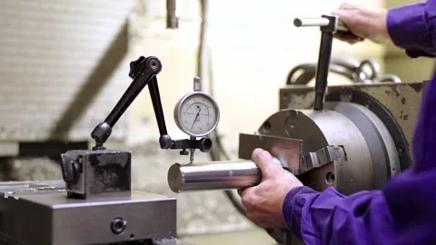 Hands of a worker using a machine in a cnc factory Stock Footage 257973399