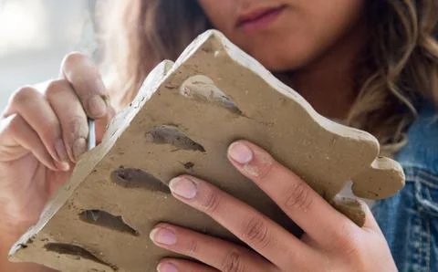 Hands working on ceramic Stock Photos