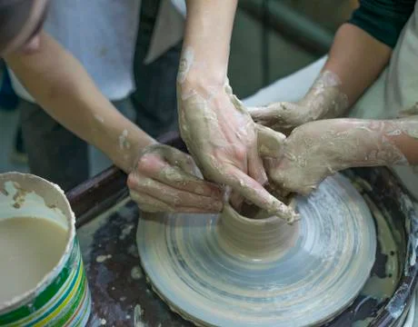 Hands working with clay Stock Photos