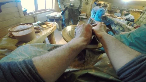 Hands working clay on potter's wheel in studio artisan master handmade 스톡 동영상 105269295
