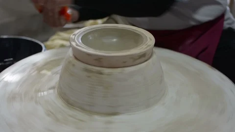 Hands working clay on potter's wheel. Stock Footage 123657655