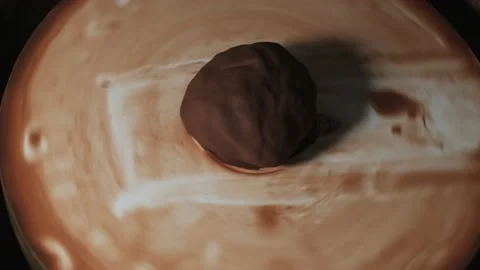 Hands working clay on potter's wheel. Potter shapes the clay product with potter Video stock 144067363