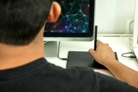 Hands working on computer on his graphics tablet. Foto stock