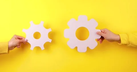 Hands Working with Gears Mechanism Setup and Repair Concept Stock Footage 325182224