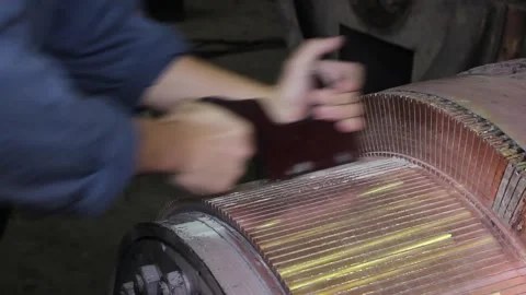 Hands of the working master prepare the electric motor for repair. Stock Footage 125547936
