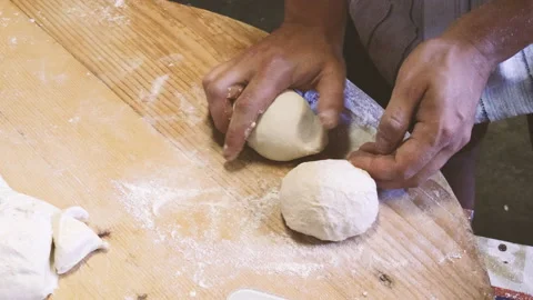 Hands working pizza dough detail Stock Footage 219629168