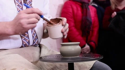 Hands working on pottery wheel Stock Footage 70673289