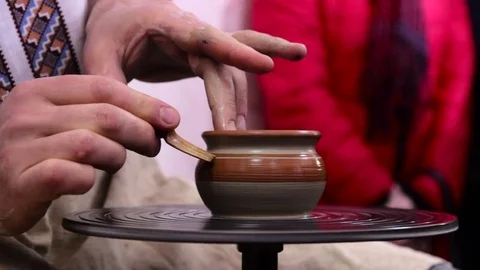 Hands working on pottery wheel Stock Footage 70674083