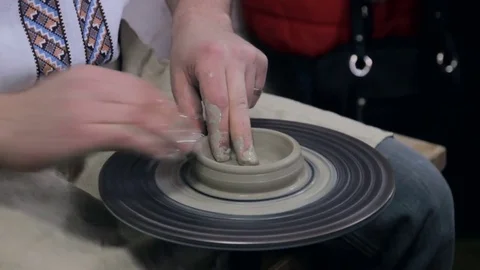 Hands working on pottery wheel Stock Footage 73781145