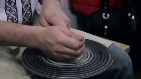 Hands working on pottery wheel Stock Footage 73783678