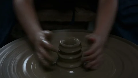 Hands working on pottery wheel Stock Footage 85922306
