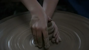 Hands working on pottery wheel Stock Footage 85922381