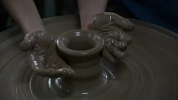 Hands working on pottery wheel Stock Footage 85922449