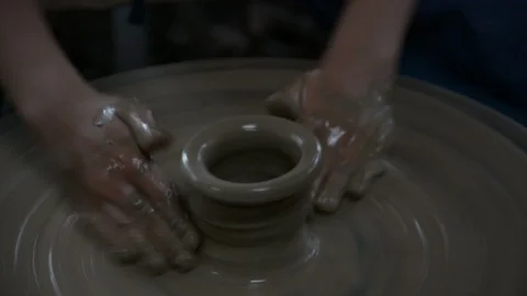 Hands working on pottery wheel Stock Footage 85922468