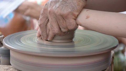 Hands working on pottery wheel Stock Footage 86728195