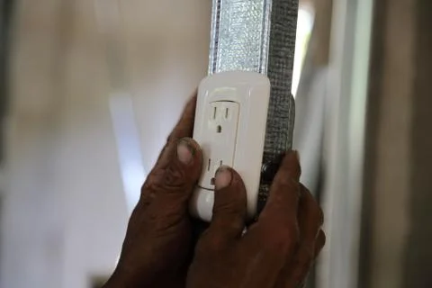 Hands working in socket Stock Photos